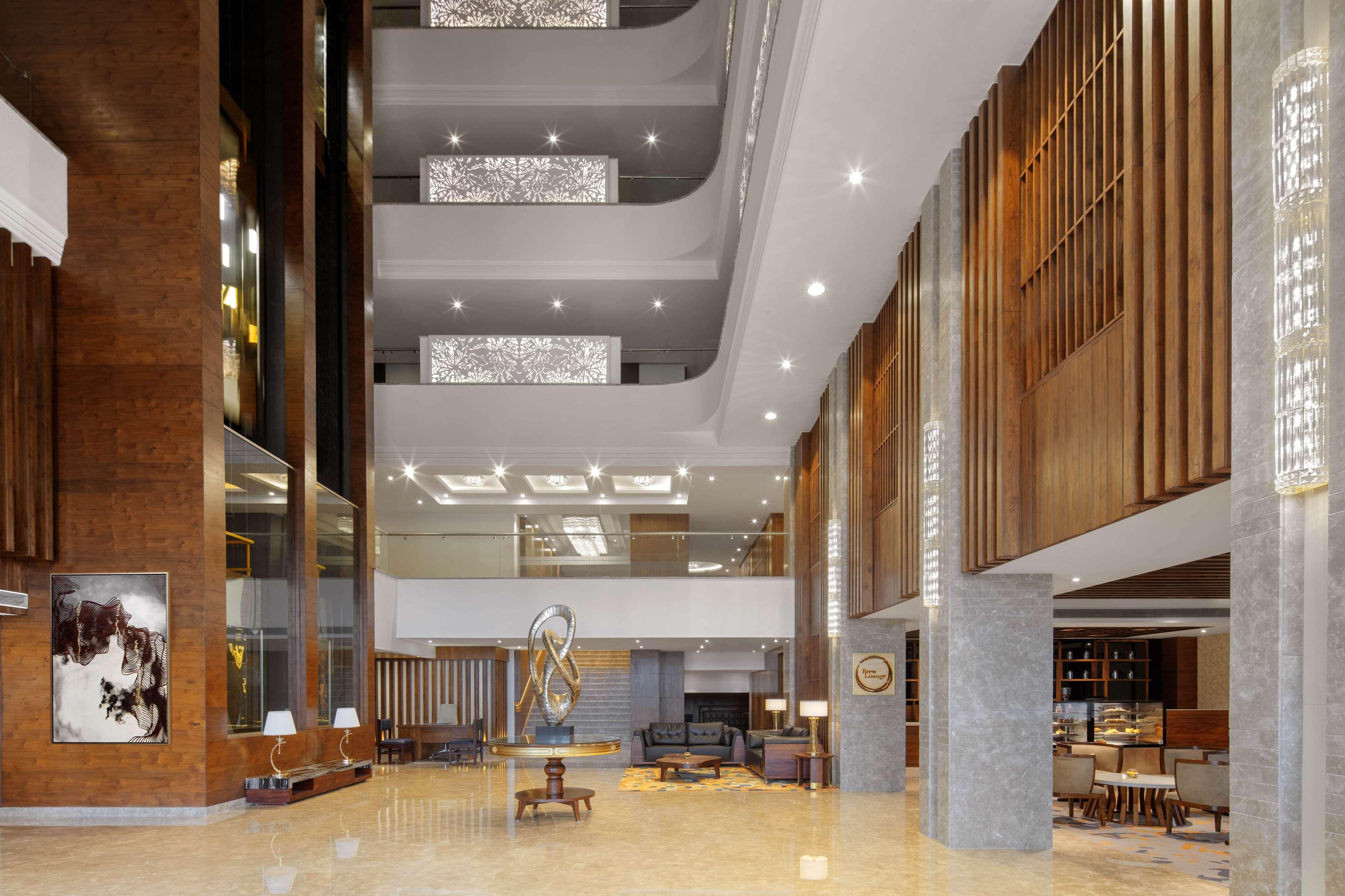Radisson Chandigarh Zirakpur Buitenkant foto The lobby of the hotel