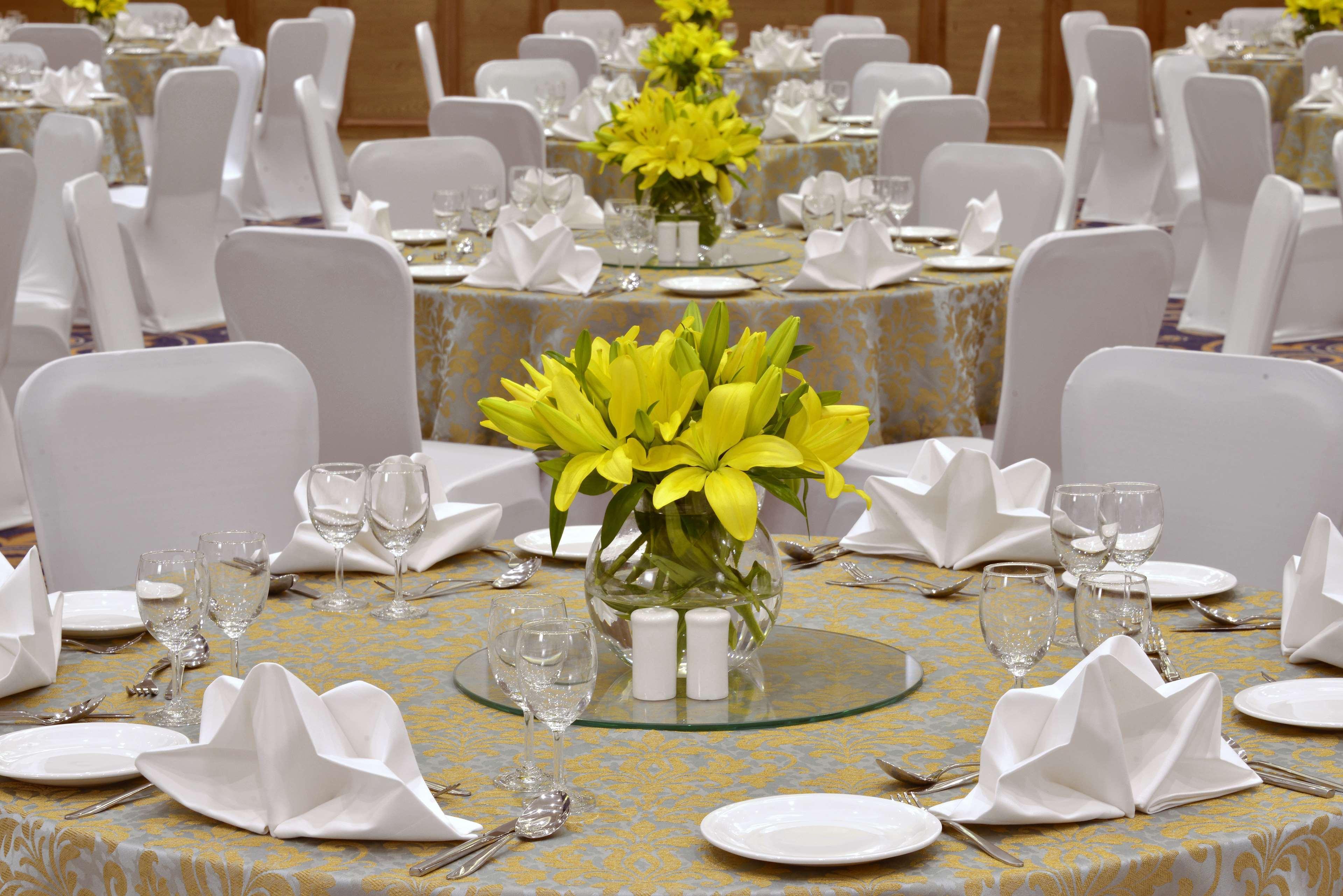 Radisson Chandigarh Zirakpur Buitenkant foto A table set for a formal dinner